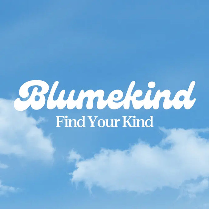 The image features a clear blue sky with scattered white clouds. The text Blumekind appears in bold, white, stylized font, and below it, in smaller text, is the phrase Find Your Kind.