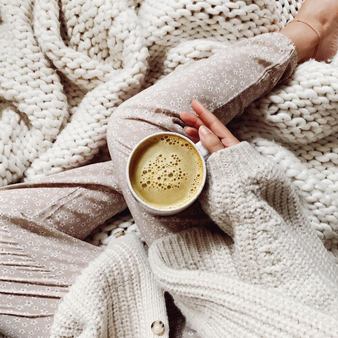 A warm cup of turmeric latte made with Blume Turmeric Blend taken by @gabrielleassaf