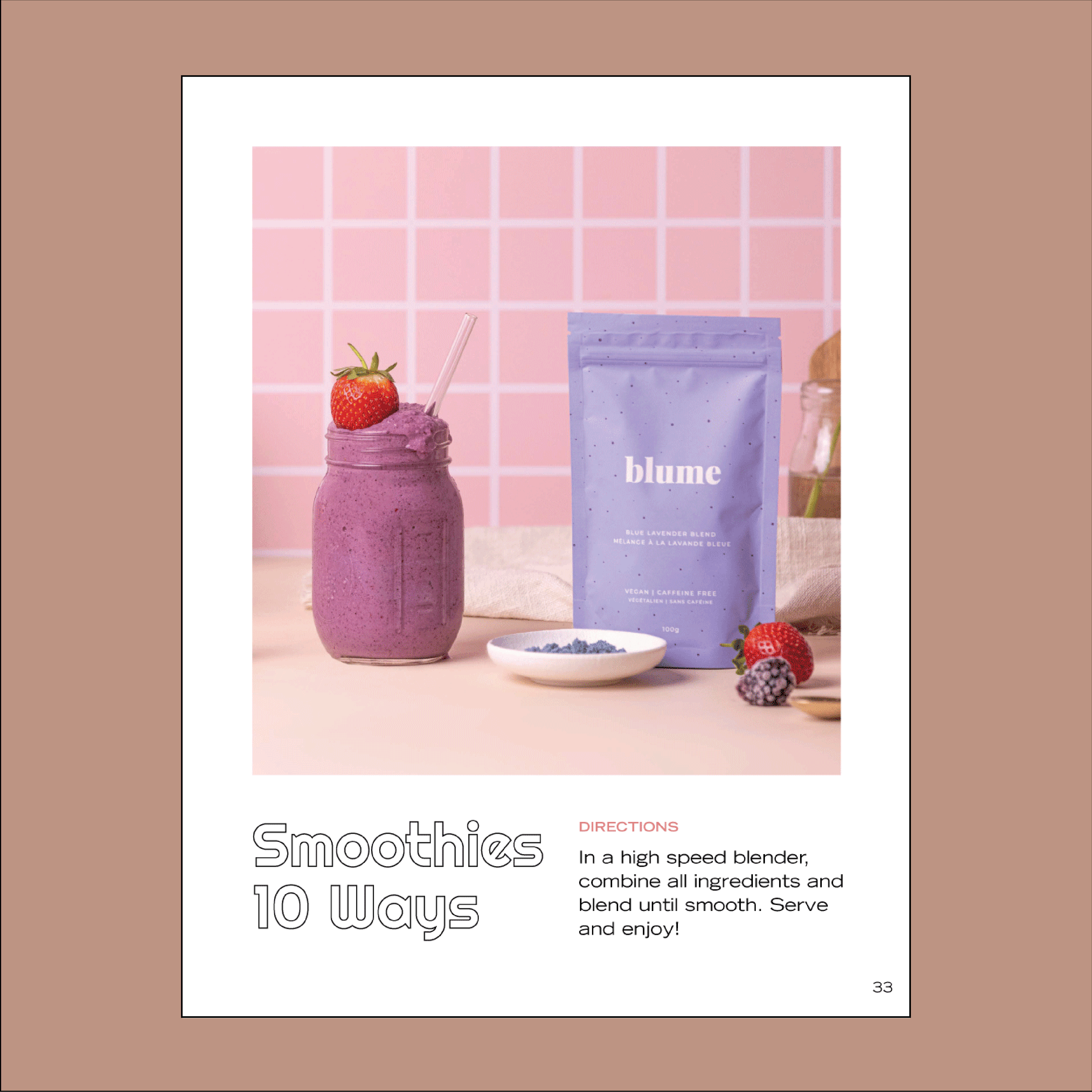 A smoothie jar with a straw and strawberry sits next to a purple Blume packet and a small bowl of powder. The pink tiled wall backdrop showcases Smoothies 10 Ways with blending instructions from Blumes core product, Our Digital Recipe Book.
