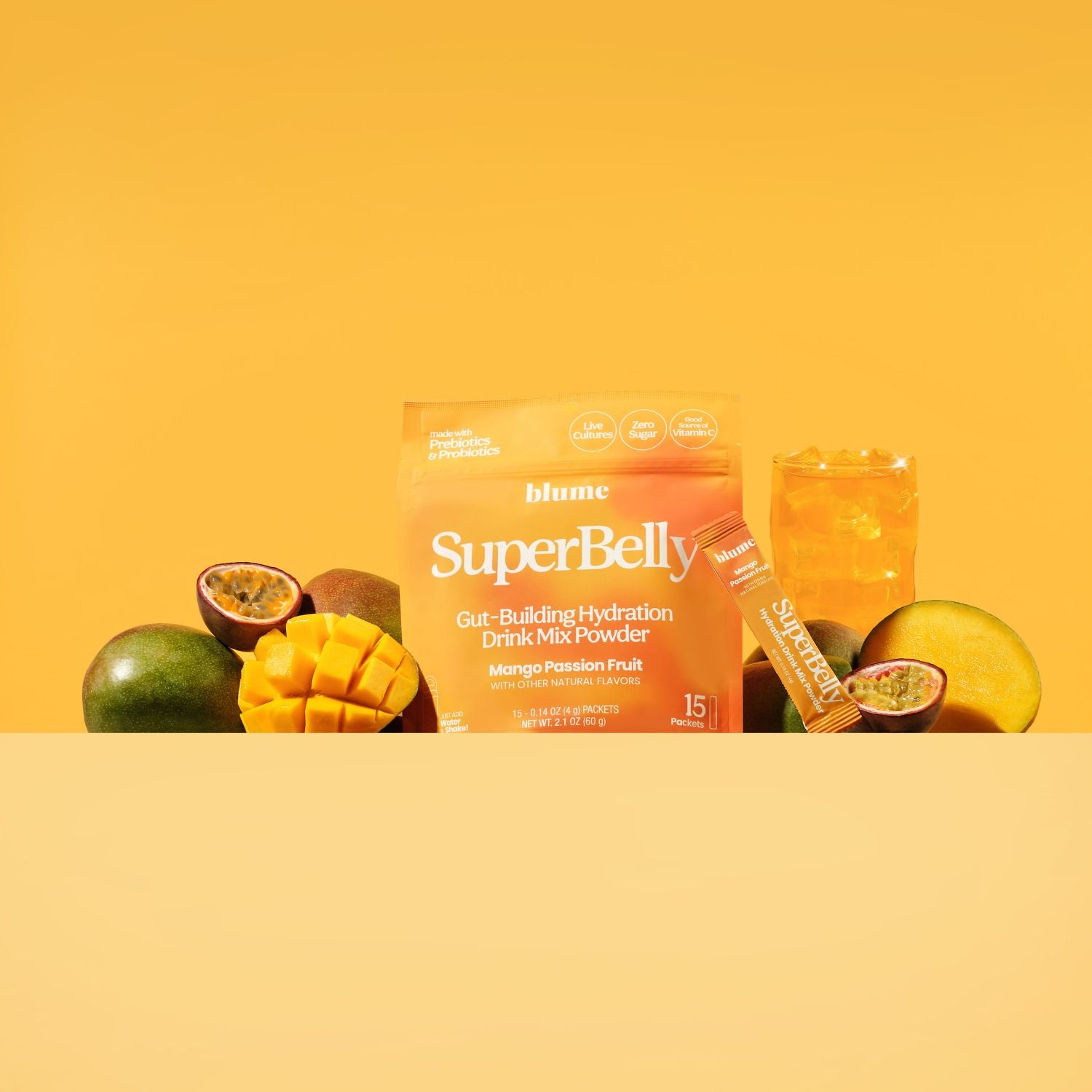 SuperBelly drink mix powder package with fruits on a yellow background