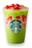 Leading cafe's iced strawberry matcha in a plastic cup with strawberries and ice cubes